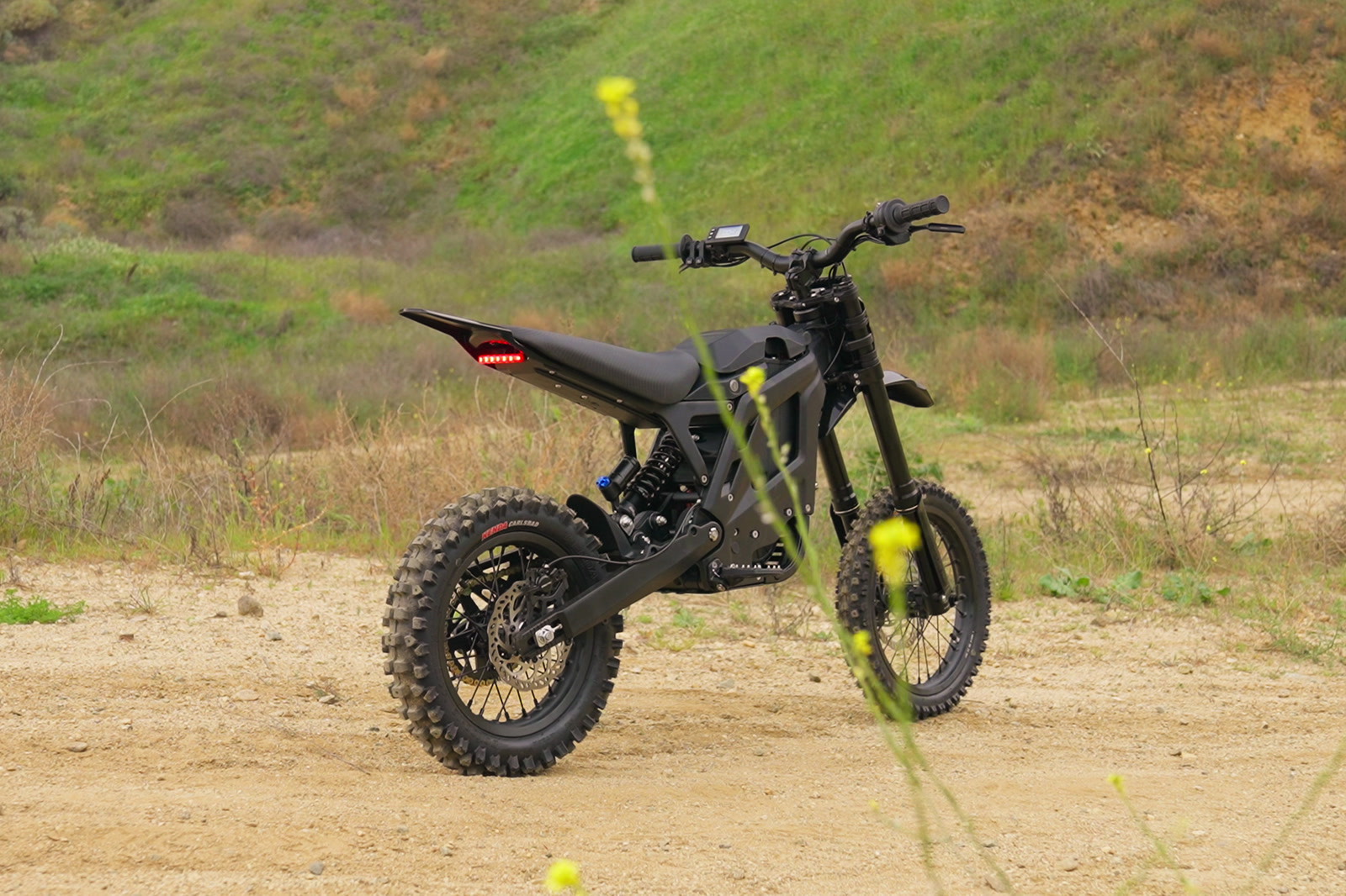 E Ride Pro Mini R electric motorcycle on the trail