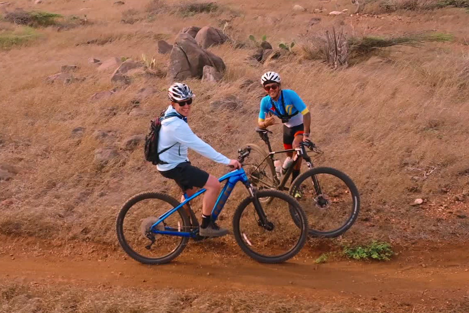 Cyclists on a dirt trail in the Inspired Bike Trails film