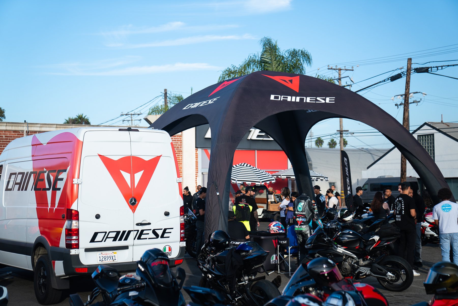 Dainese Orange County anniversary celebration with riders and motorcycles